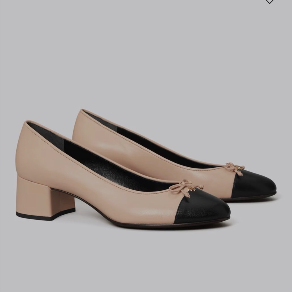 Tory Burch New Cap Toe Pump Color:
Rose Pink / Perfect Black